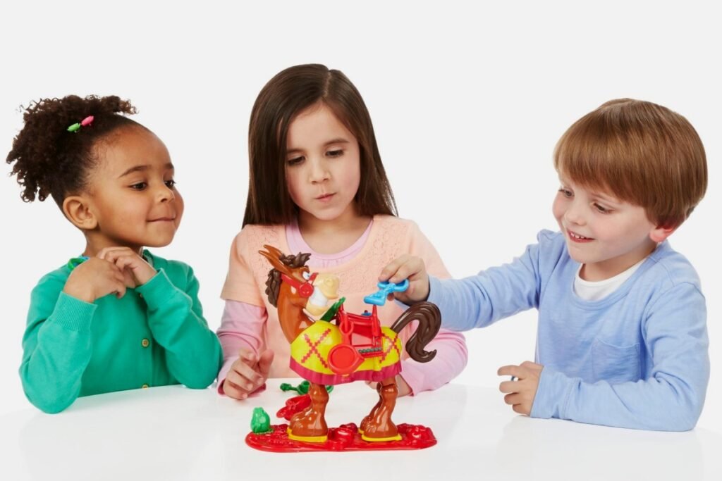 The Buckaroo Board Game is a stacking game for two or more players, ages 4 and up, that involves loading a horse with gear for a gold mining journey. 